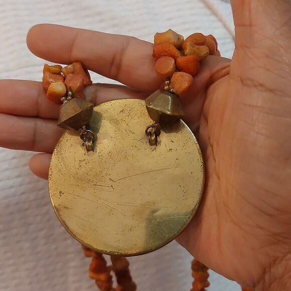 Is the  Vintage Genuine Sponge Coral Beads Double Strand Necklace Red Orange Pendant